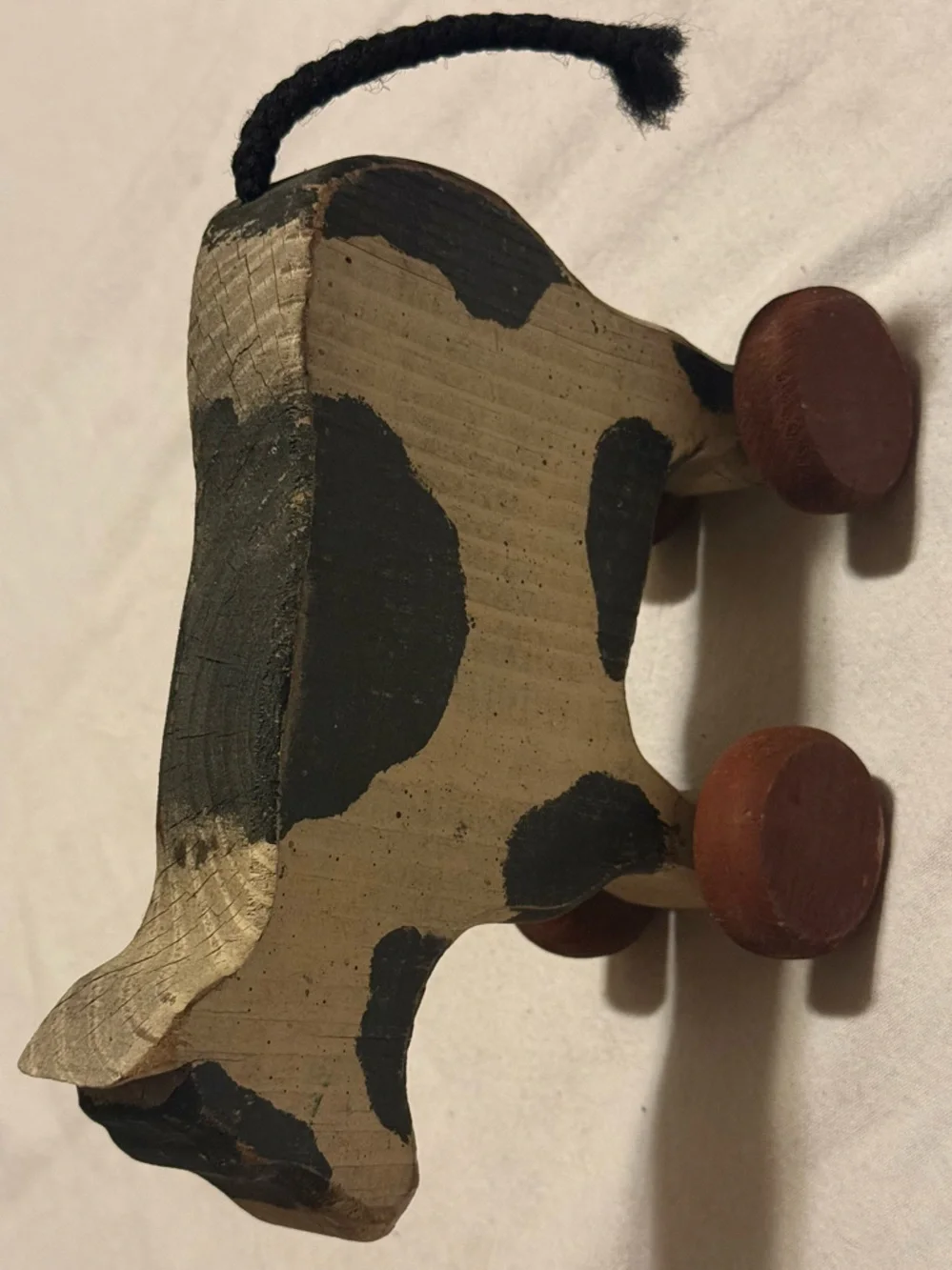 Handcrafted Wood Cow Accent in Black and cream